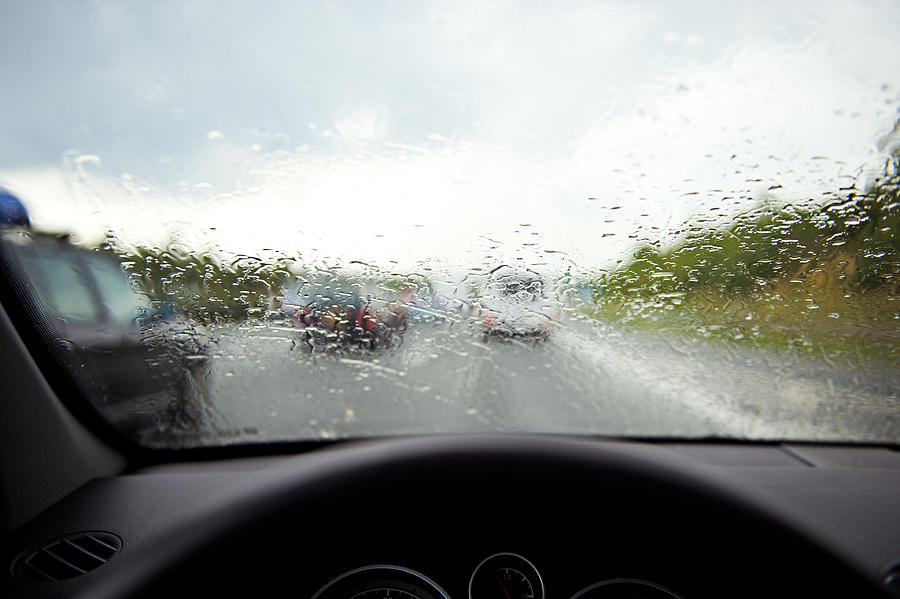Driving in rainy weather Photograph by Cruphoto