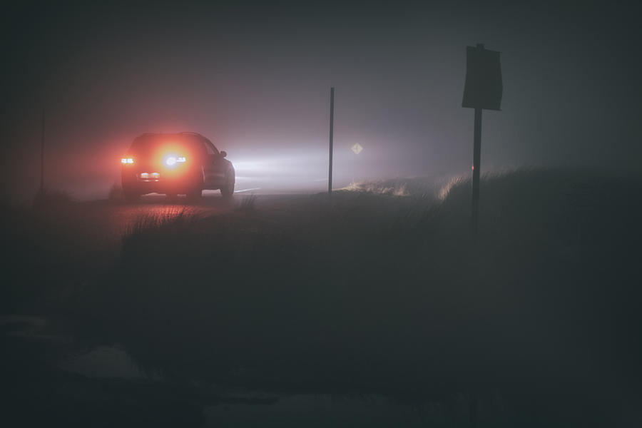 Driving in thick fog at night Photograph by Image by Catherine MacBride