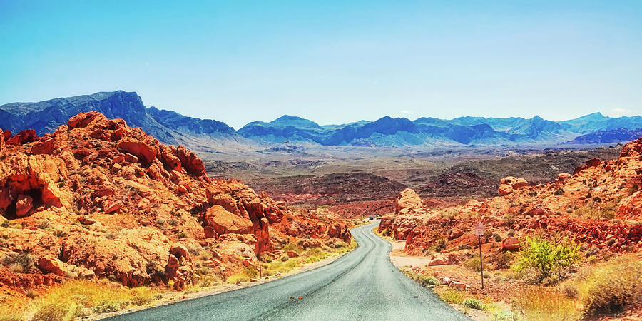 Driving through the Valley of Fire, Nevada Photograph by Tatiana Travelways