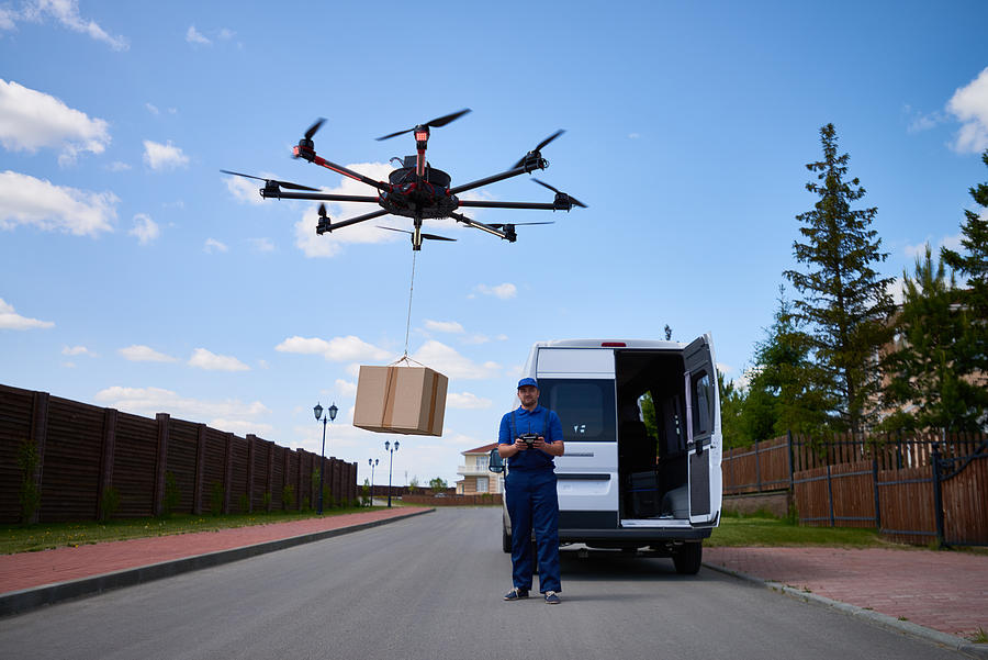Drone delivery of goods Photograph by CliqueImages