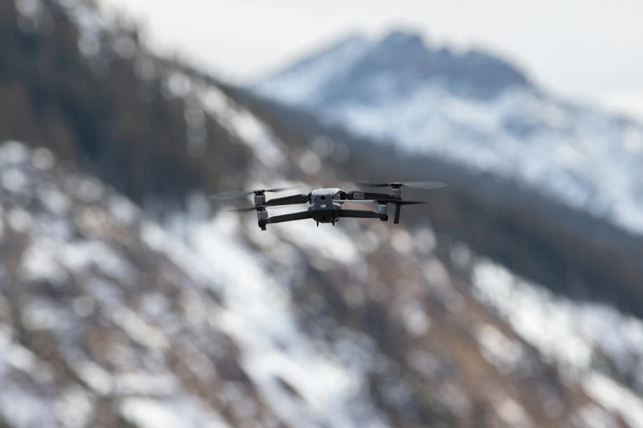 Drone in the mountains  Photograph by John McGraw
