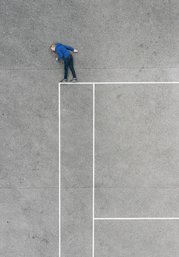 Drone photo of man looking over the edge Photograph by Justin Paget