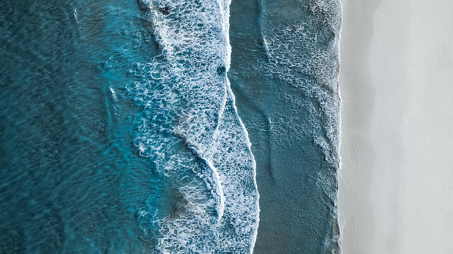 Drone shot showing waves rolling onto a beach, Esperance, Australia Photograph by Abstract Aerial Art