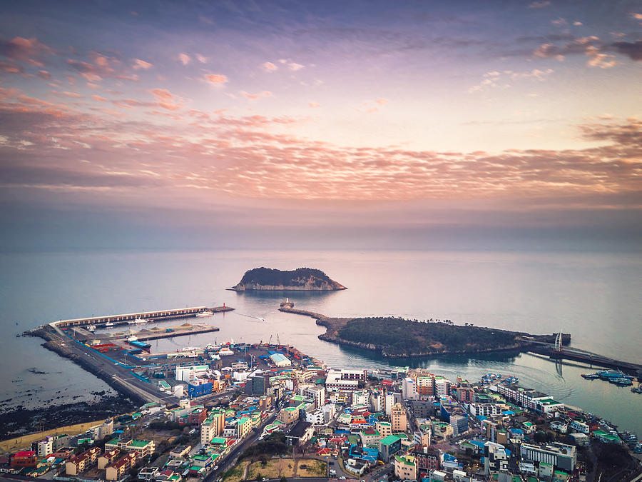 Drone view of the Seogwipo city on Jeju island, South Korea Photograph by Shan.shihan