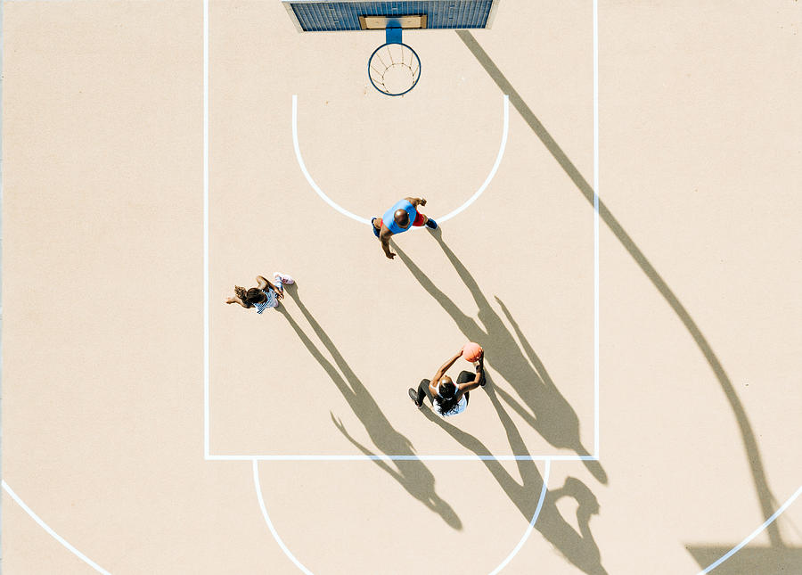 Drone View On African Family Playing Basketball Together At Hot Sunny Afternoon Photograph by Golero
