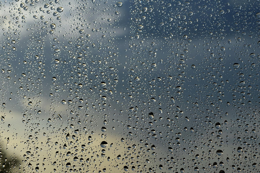 Drops of rain on the window Photograph by Sergpet