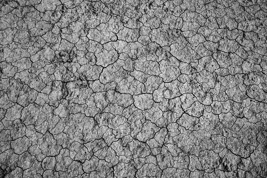 Dry cracked soil during drought  Relief by Mikhail Kokhanchikov