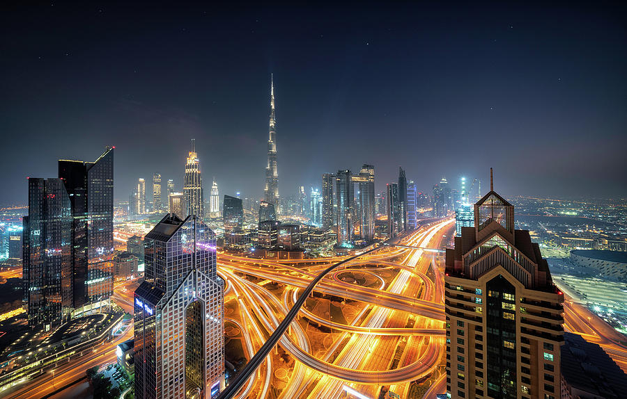 Dubai Skyline from hotel at blue hour sunset. Skycrapers can be seen as ...