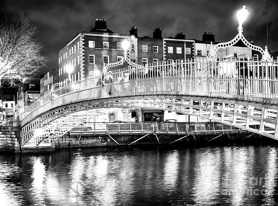 Dublin HaPenny Bridge Night Glow in Ireland Photograph by John Rizzuto