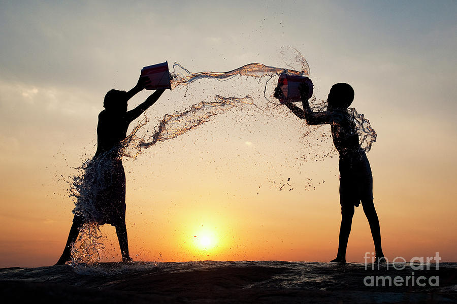 Sunset Photograph - Duelling Water Buckets by Tim Gainey