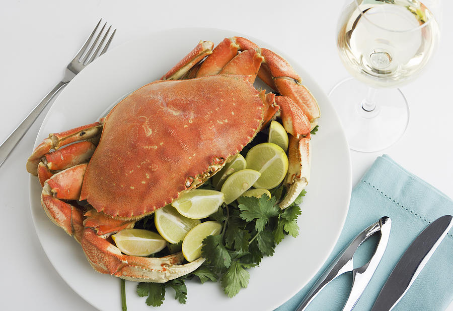 Dungeness Crab Seafood Dinner, Cooked, Prepared, and Served with Wine Photograph by YinYang Dungeness Crab Seafood Dinner, Cooked, Prepared, and Served with Wine Photograph by YinYang