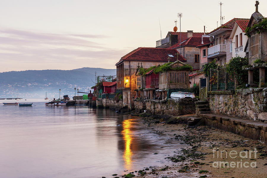 Dusk at Fishing Town of Combarro in Pontevedra Estuary at Low Tide Galicia Photograph by Pablo Avanzini
