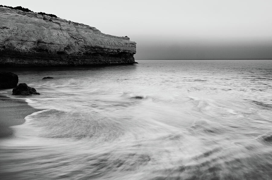 Dusk Scene in Albandeira beach. Monochrome Photograph by Angelo DeVal