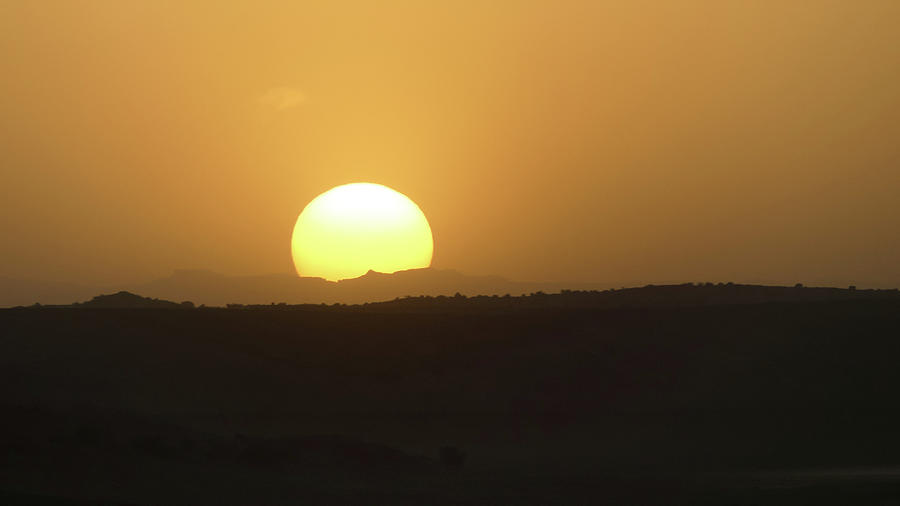 Dusty Sunset Photograph by Margaret Pitcher