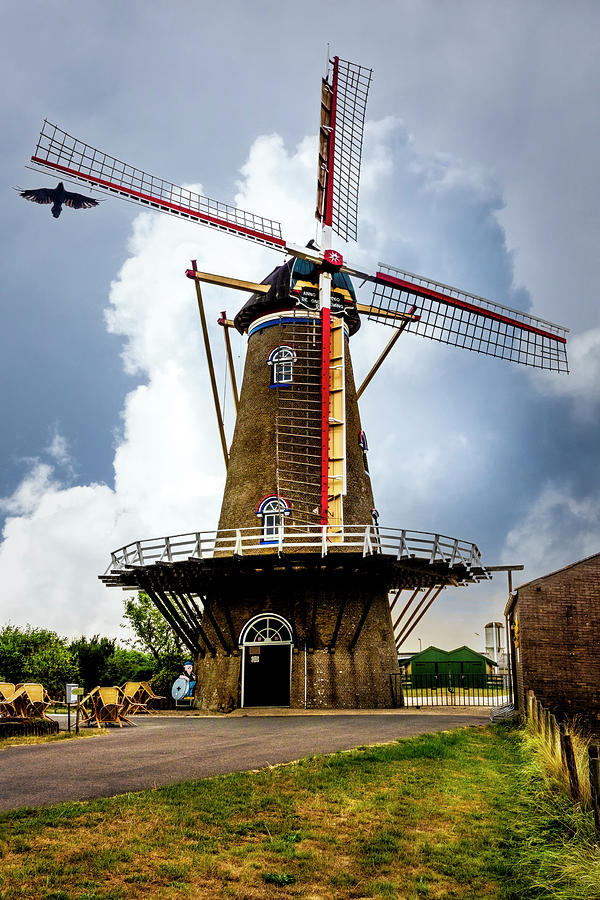 Dutch Windmill in the Countryside Photograph by Debra and Dave Vanderlaan
