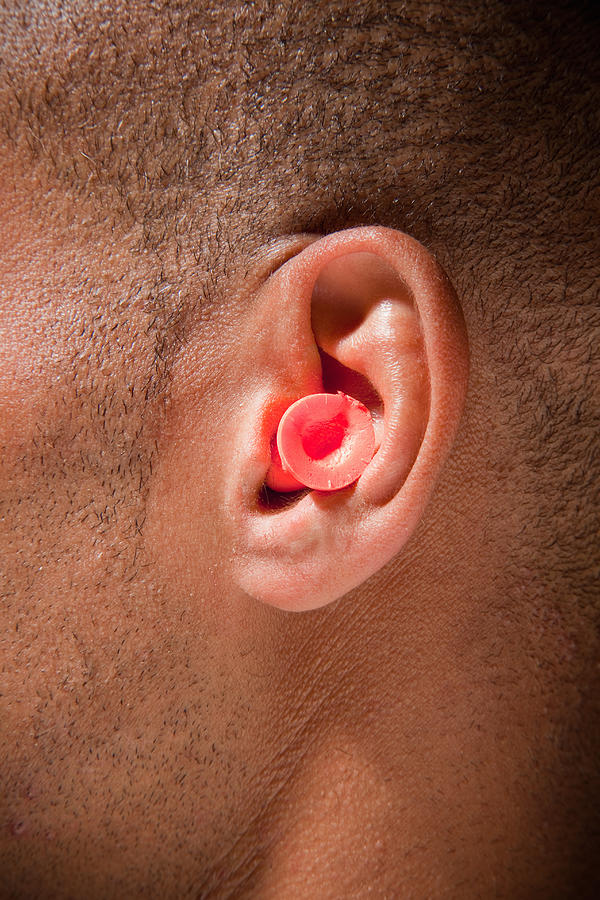 Ear plug  Photograph by PM Images