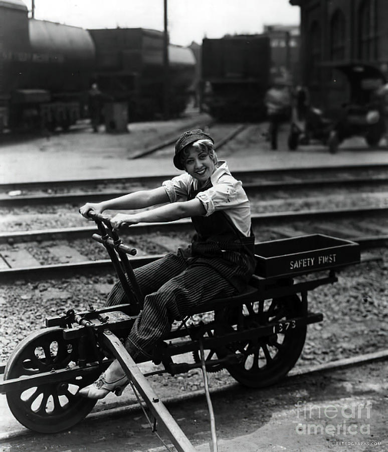 Early 1900s woman and railroad track machine Photograph by Retrographs