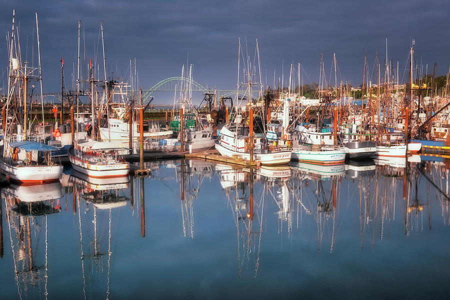 Early morning reflection of the Newport Fishing Fleet with the Yaquina ...