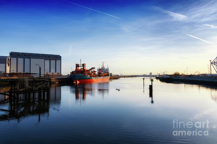 Early morning sunshine over Middlesbourgh Docks. Photograph by Phill Thornton