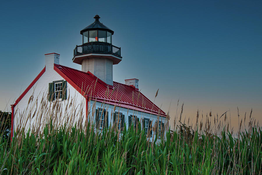East Point Lighthouse at twilight Photograph by Daniel Adams