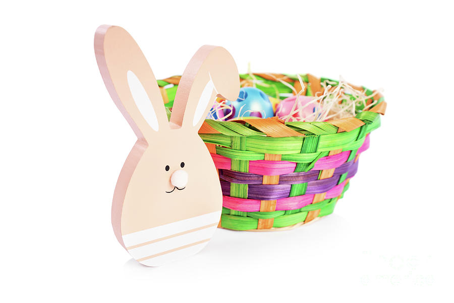 Easter bunny and a basket filled with colourful eggs Photograph by Mendelex Photography