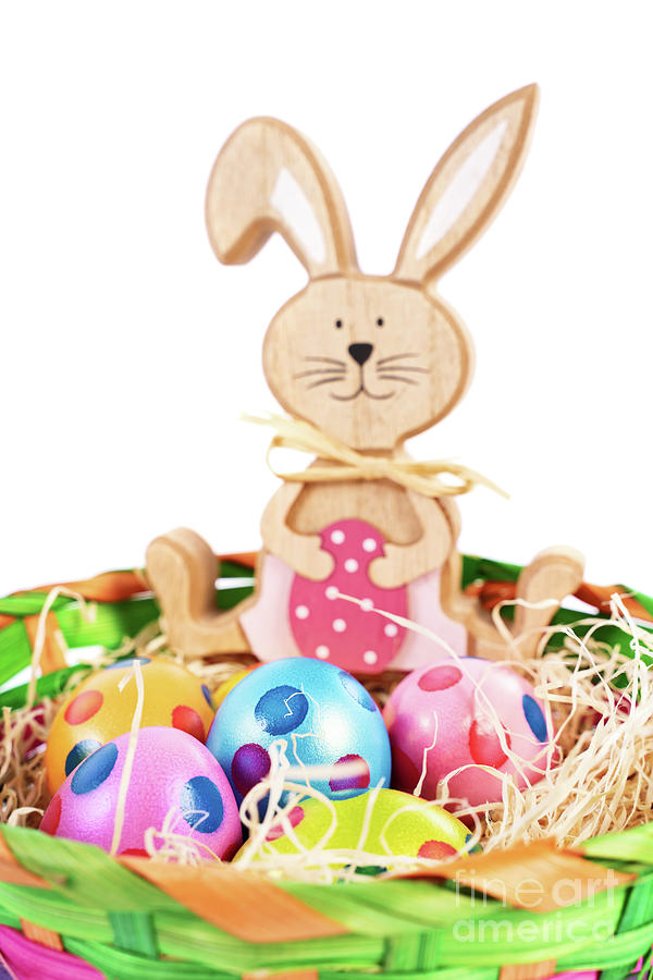 Easter bunny with colourful eggs with polka dots in a basket Photograph by Mendelex Photography
