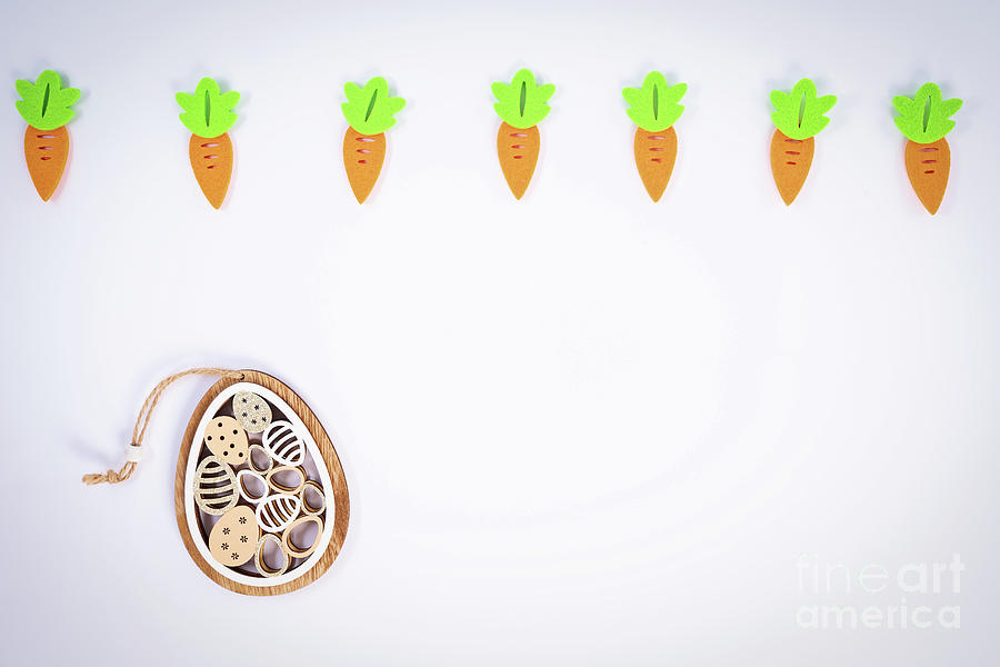 Easter pattern with carrots and cute Easter egg decoration Photograph by Mendelex Photography