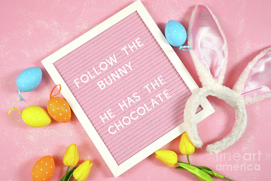 Easter product mockup with bunny ears and easter eggs on pink background flatlay Photograph by Milleflore Images