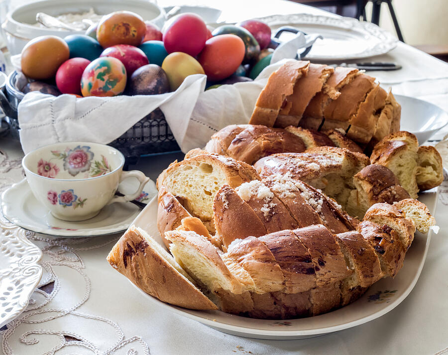 Easter table arrangement with bread, eggs and hot drink Photograph by VioNettaStock