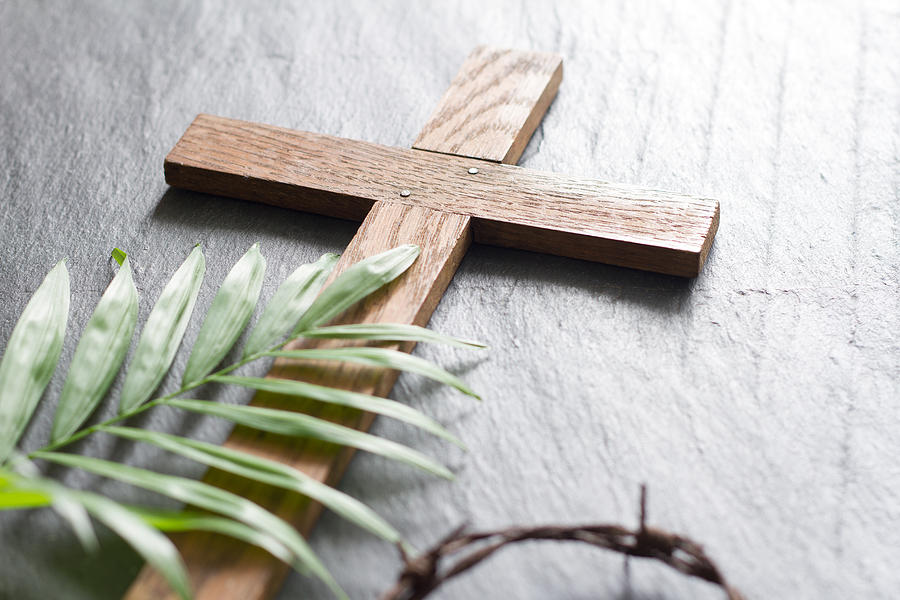 Easter wooden cross on black marble background religion abstract palm sunday concept Photograph by Udra