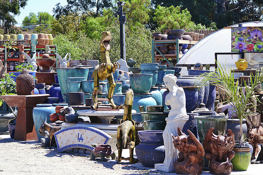 Eclectic Yard Art Display Photograph by Gaby Ethington