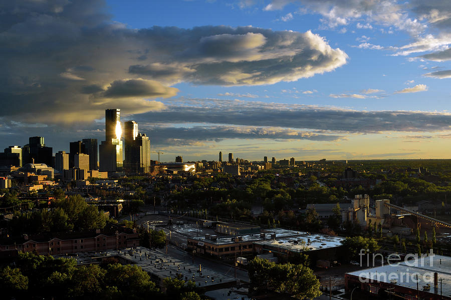 Edmonton Downtown In Evening With Amazing Clouds And Sunshine Photograph by Terry Elniski