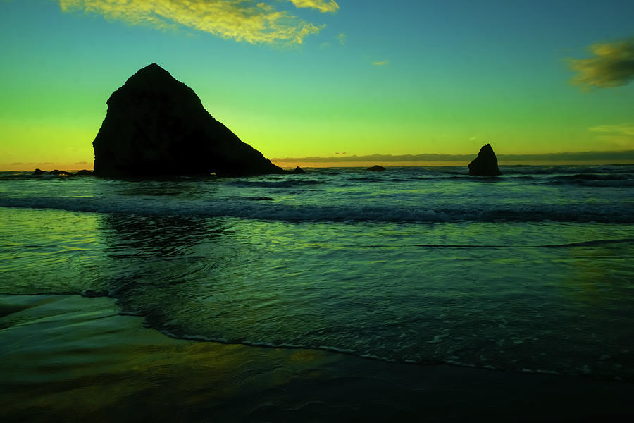 Egg yoked sunset Canon beach south Photograph by Jeff Swan