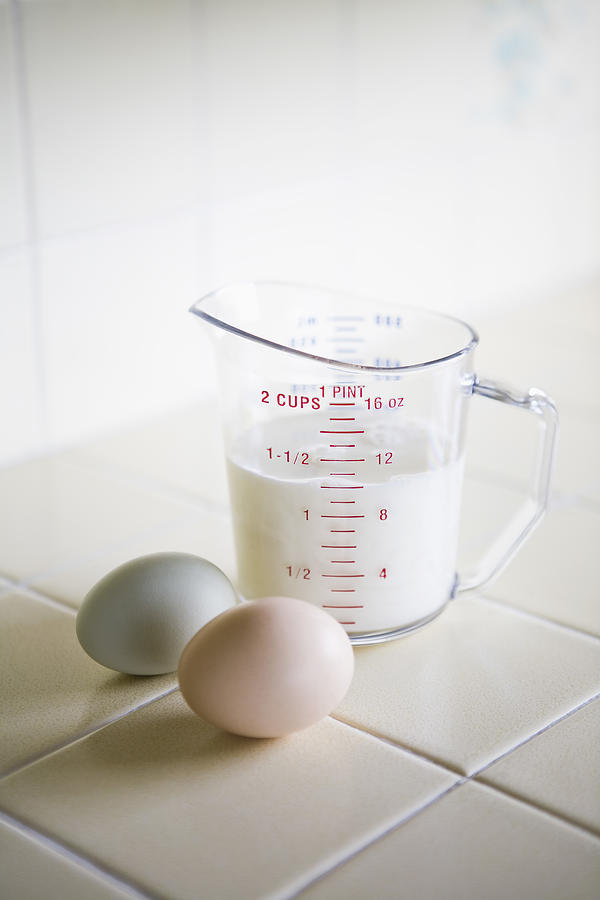 Eggs and pitcher of milk Photograph by Brantlea Newbery
