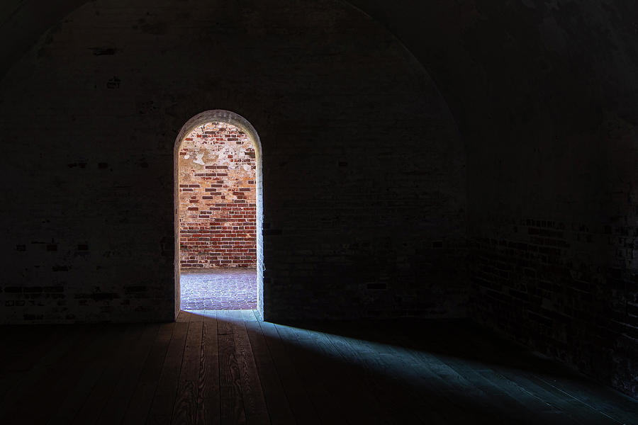 Egress - From Darkness to Light at Fort Macon Photograph by Bob Decker