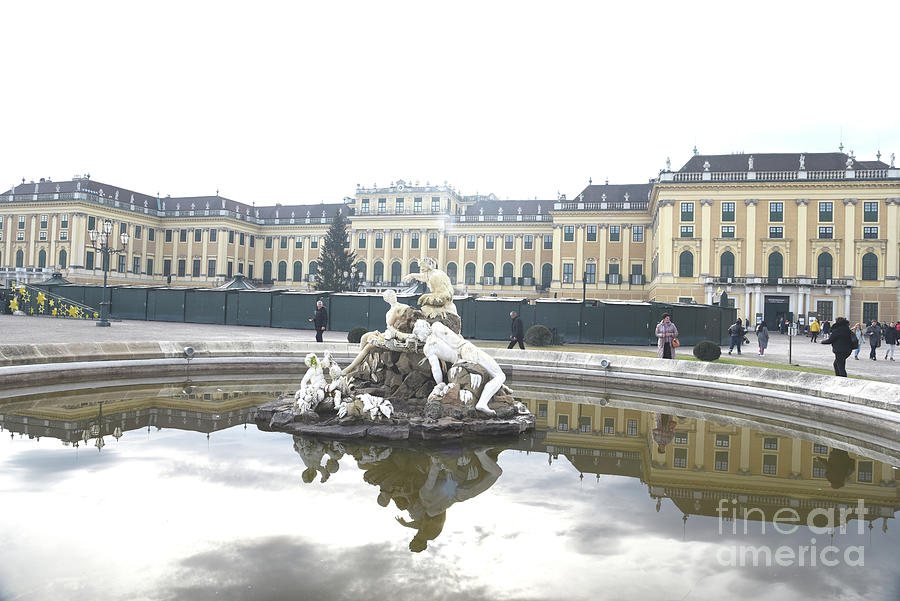 Ehrenhof Fountain At The  Schonbrunn Palace At Christmas Market Time. Photograph by Tom Wurl