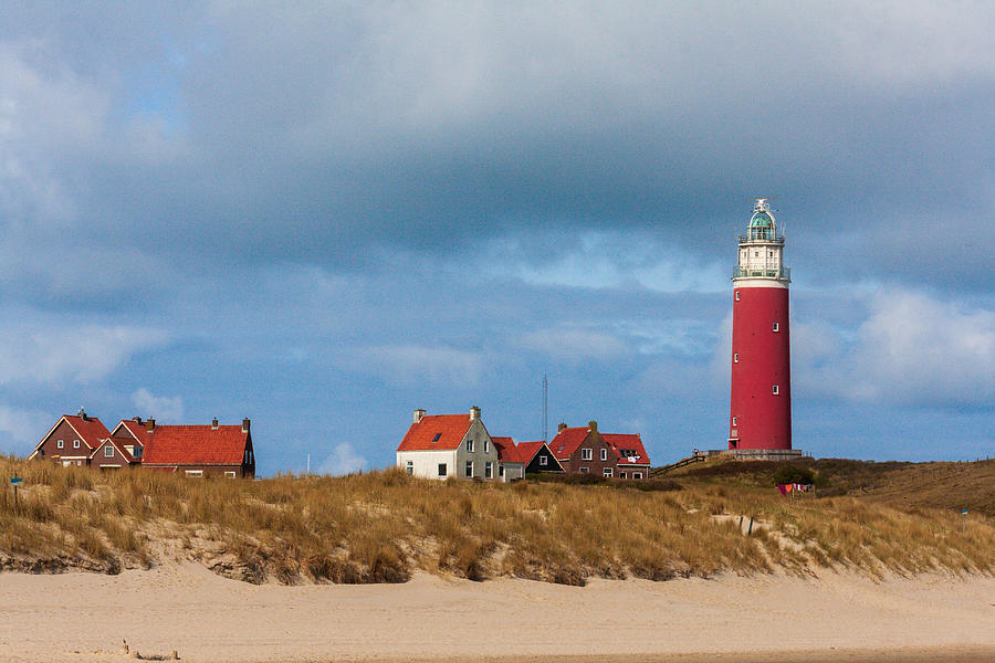 Eierland Lighthouse on the island of Texel, the Netherlands Photograph by Flottmynd