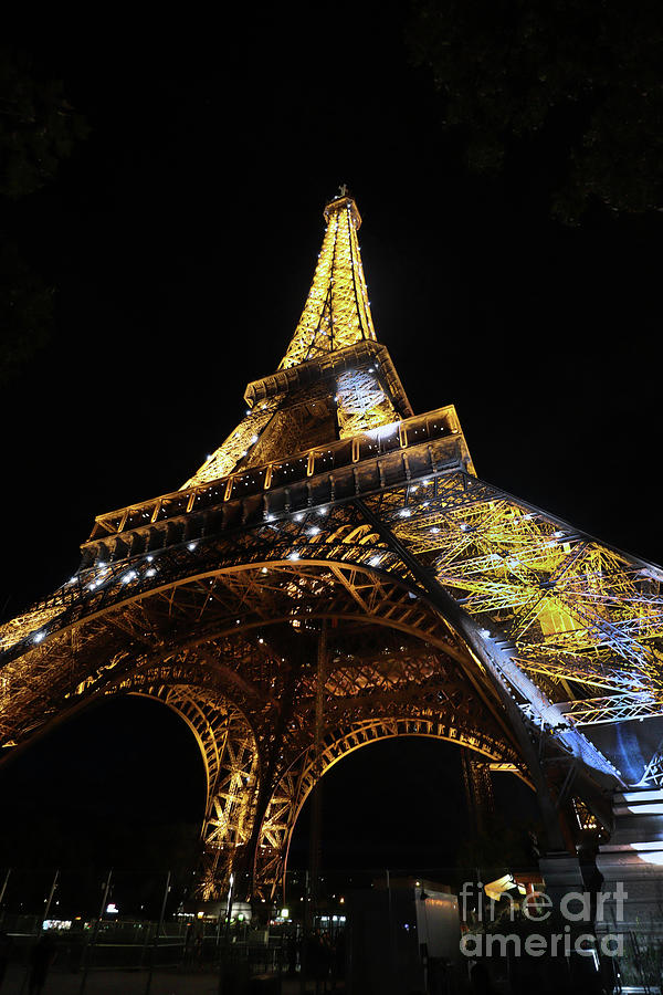 Eiffel Tower at night with flashing lights Photograph by Steven Spak