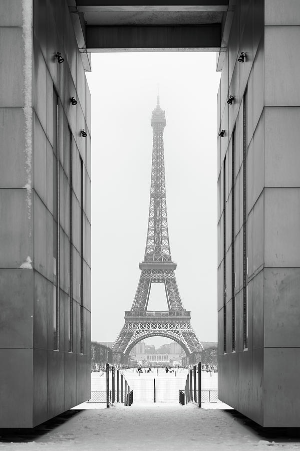 Eiffel tower under the snow in Paris Photograph by Philippe Lejeanvre