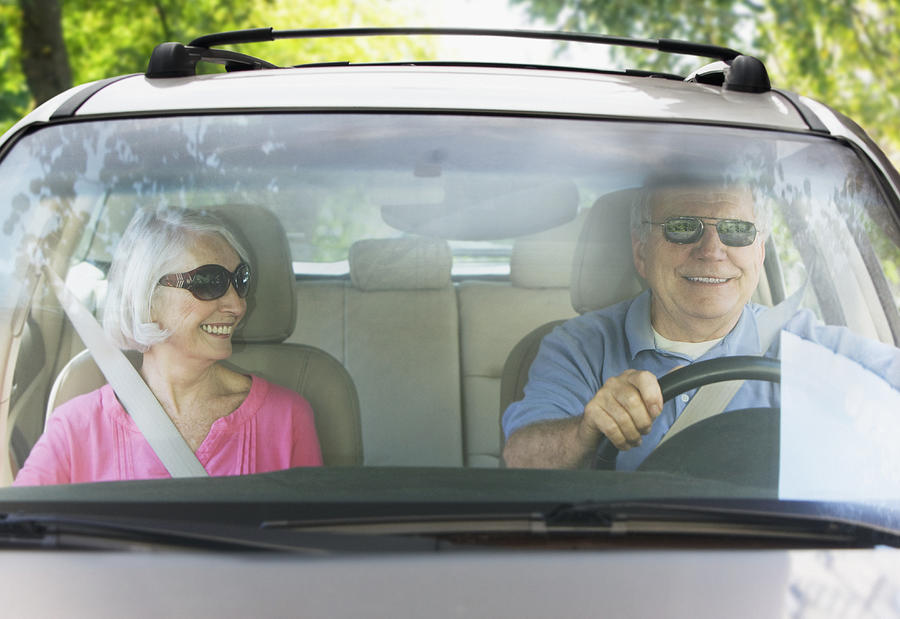 Elderly couple taking road trip Photograph by SelectStock