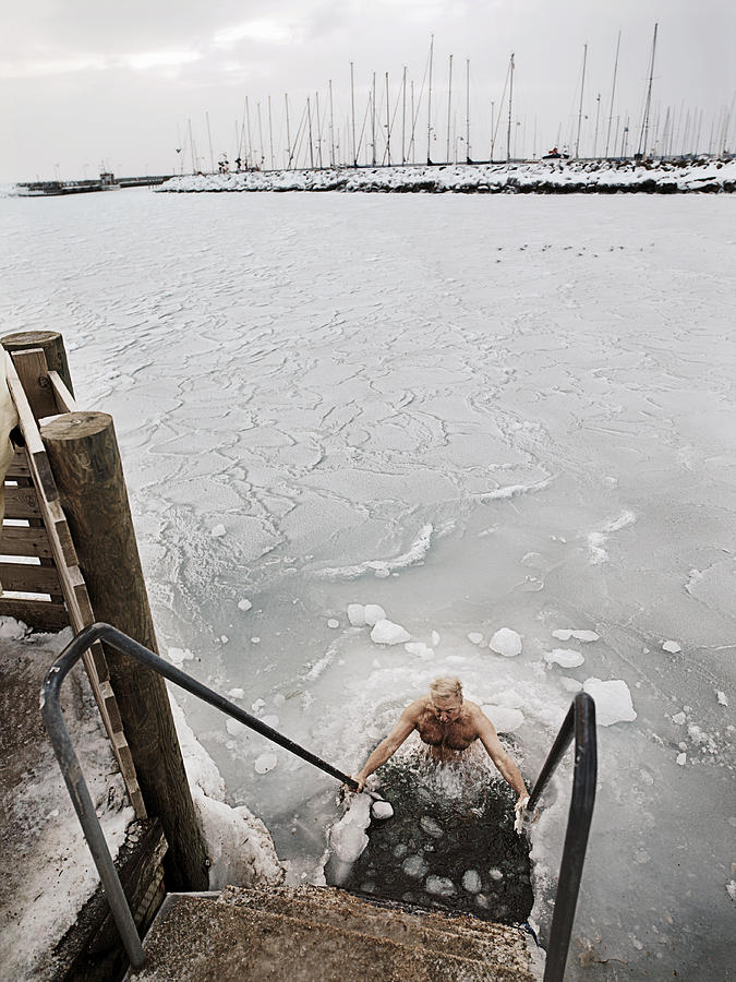 Elderly man winter bathing Photograph by David Trood