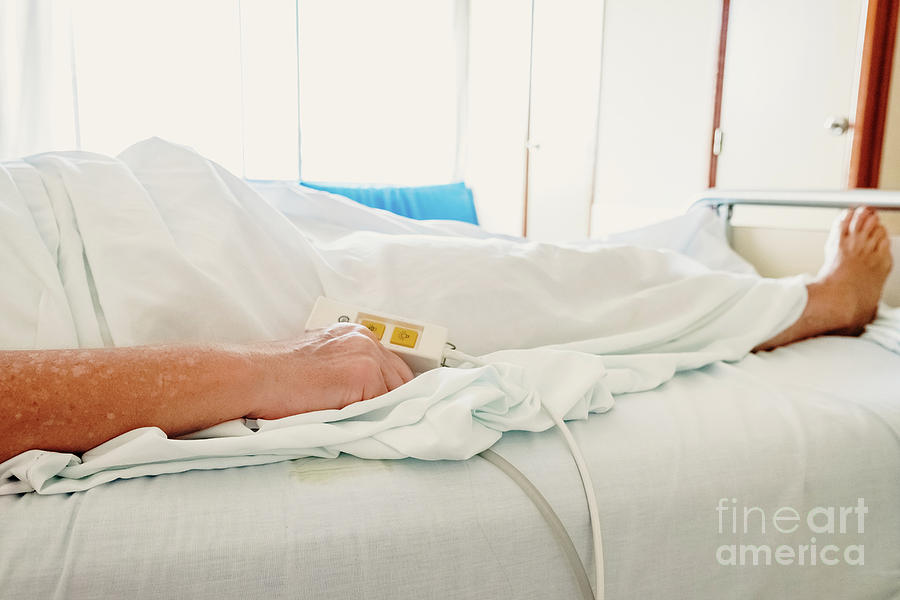 Elderly woman convalescing a bedridden disease. Photograph by Joaquin Corbalan