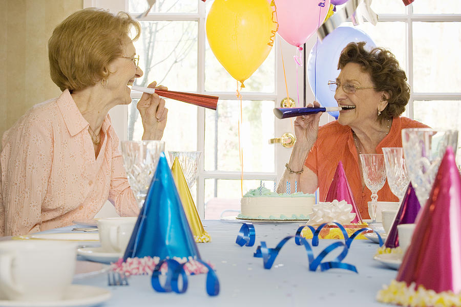 Elderly Women at Birthday Party Celebrating Photograph by Shannon Fagan