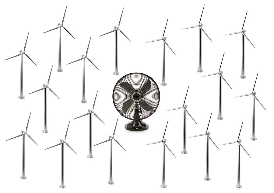 Electric fan and many wind turbines Photograph by Nicholas Eveleigh