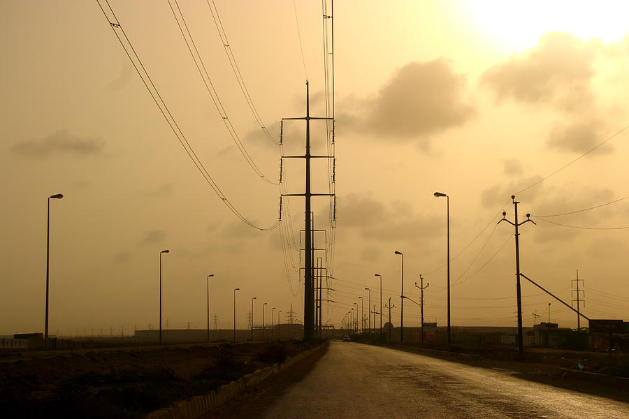 Electric poles and wires Photograph by Amir Mukhtar