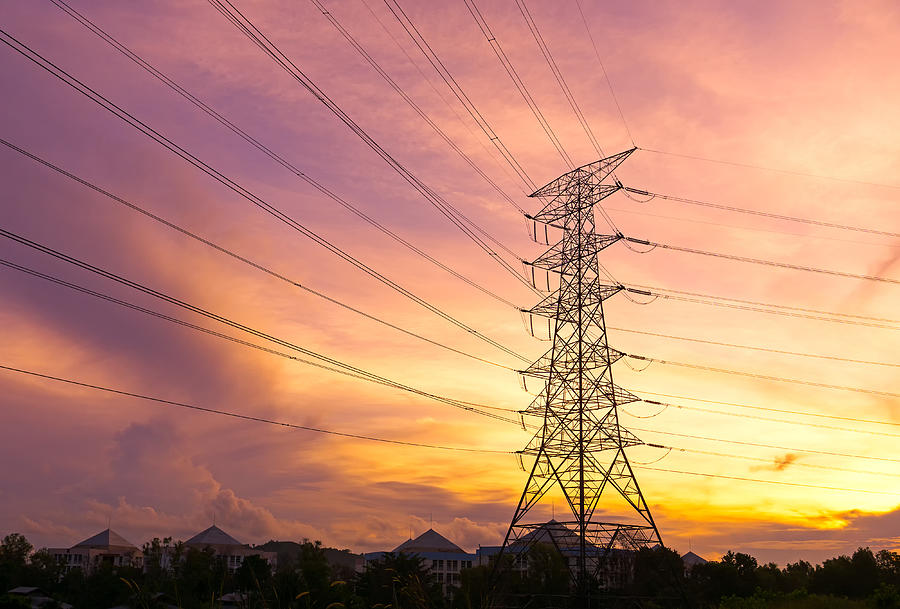 Electrical Pylons Tower During Sunset Photograph by Nora Carol Photography