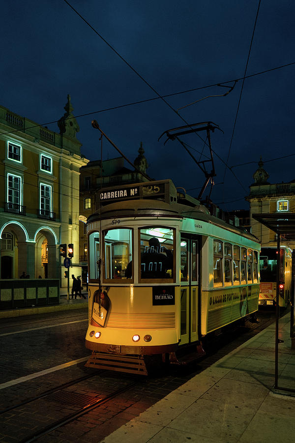 Electrico at night in Terreiro do Paco Photograph by Angelo DeVal