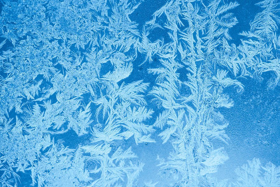 Elegant pattern of frost on window Photograph by Comstock