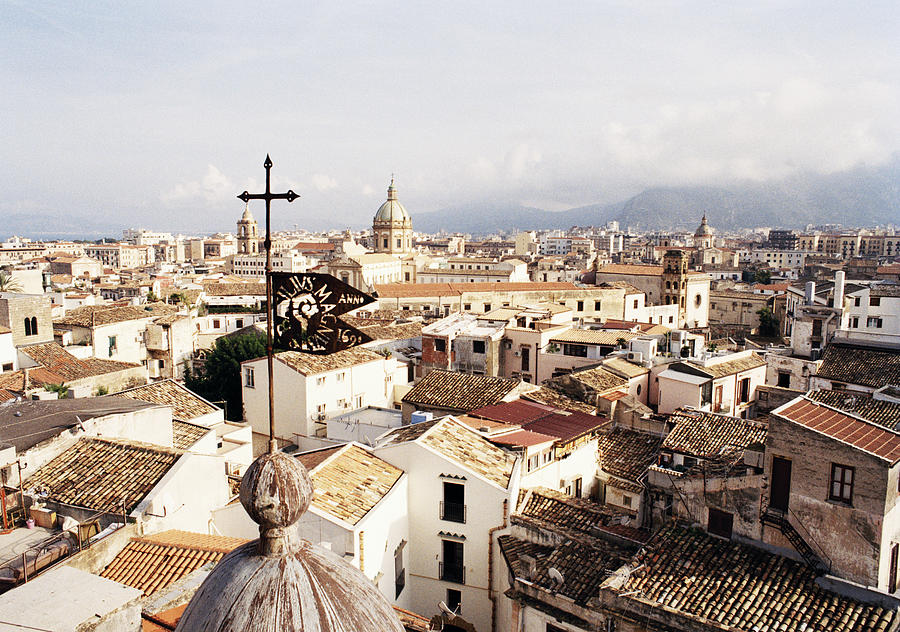 Elevated view over tiled rooftops of Palermo Photograph by Gary Yeowell