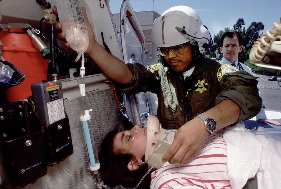 Emergency Patient At Rescue Helicopter On Helipad Photograph By Wernher ...